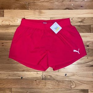 Bright pink puma running shorts, size medium